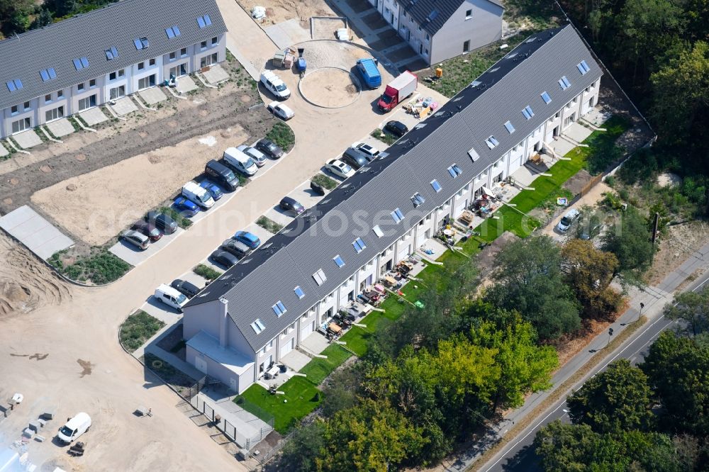 Berlin from the bird's eye view: Construction sites for new construction residential area of detached housing estate on Hultschiner Damm in the district Mahlsdorf in Berlin, Germany