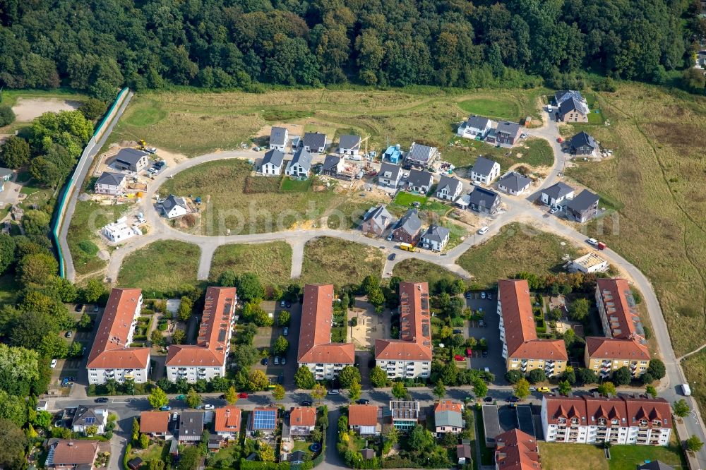 Dortmund from the bird's eye view: Building sites to the new building residential area of a single-family dwelling settlement in the Rahmer wood in Roentgen street in Dortmund in the federal state North Rhine-Westphalia