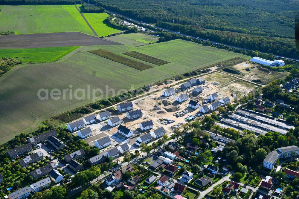 Aerial photograph Rüdersdorf - Construction sites for new construction residential area of detached housing estate in Ruedersdorf in the state Brandenburg, Germany