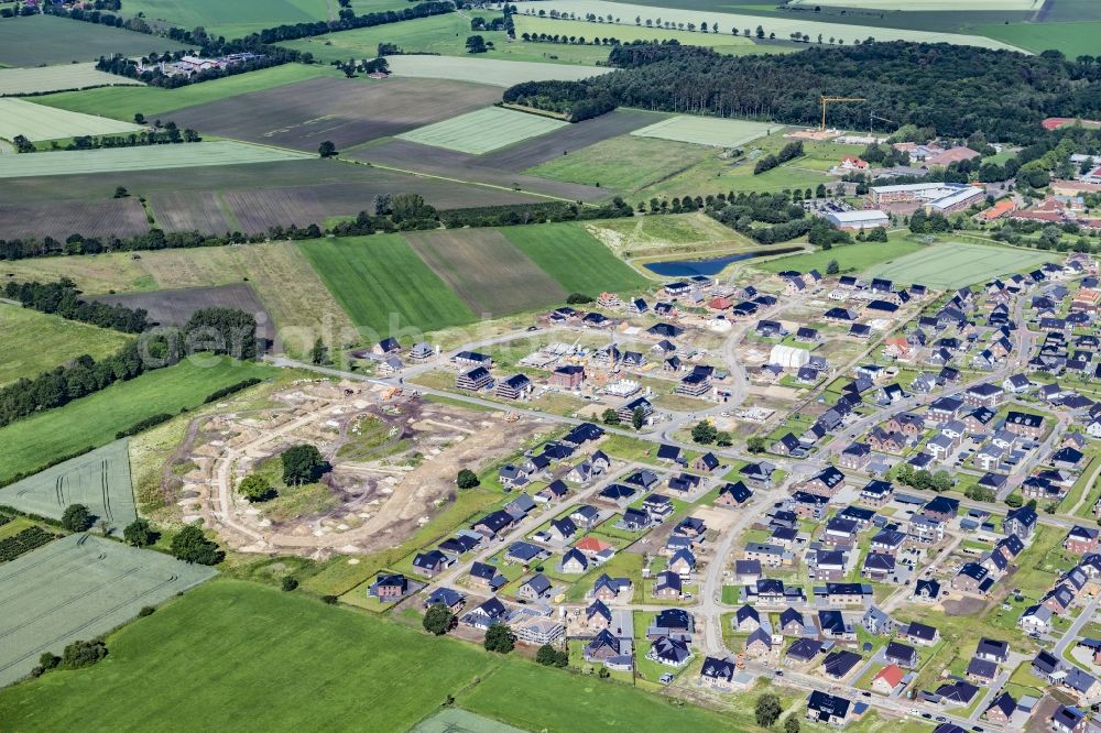 Harsefeld from above - Construction sites for new construction residential area of detached housing estate Redderbusch - Am Wischfeld in Harsefeld in the state Lower Saxony, Germany