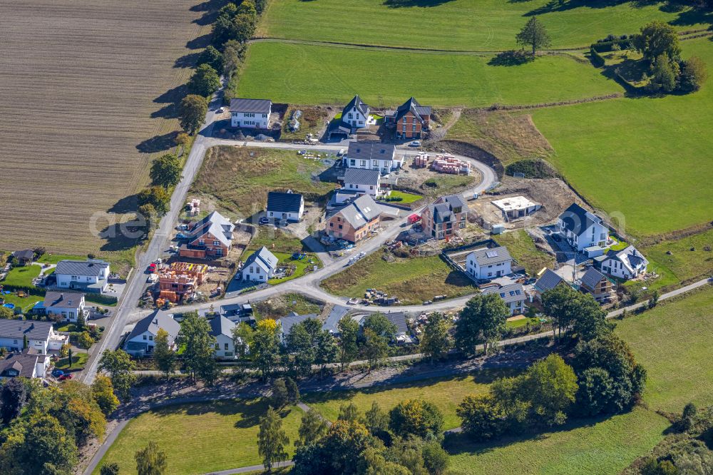 Schmallenberg from the bird's eye view: Construction sites for new construction residential area of detached housing estate An der Viehbahn in Schmallenberg at Sauerland in the state North Rhine-Westphalia, Germany