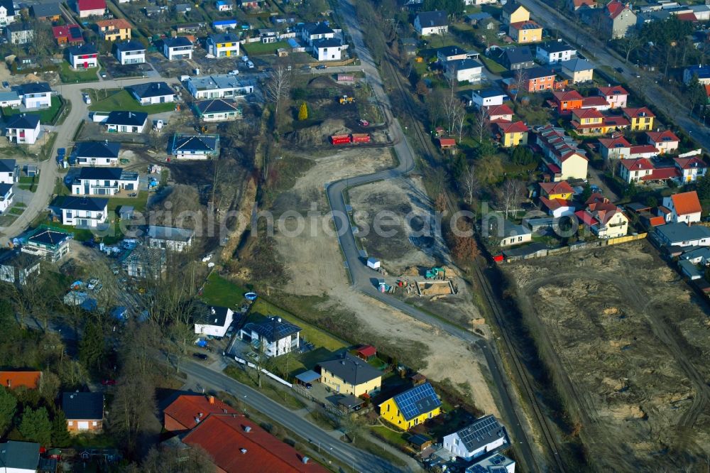 Schildow from the bird's eye view: Construction sites for new construction residential area of detached housing estate Schoenfliesser Strasse in Schildow in the state Brandenburg, Germany