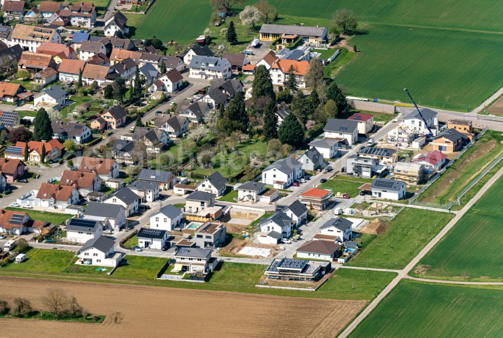 Aerial image Orschweier - Construction sites for new construction residential area of detached housing estate on Schwalbenweg Wiesenstrasse in Orschweier in the state Baden-Wuerttemberg, Germany