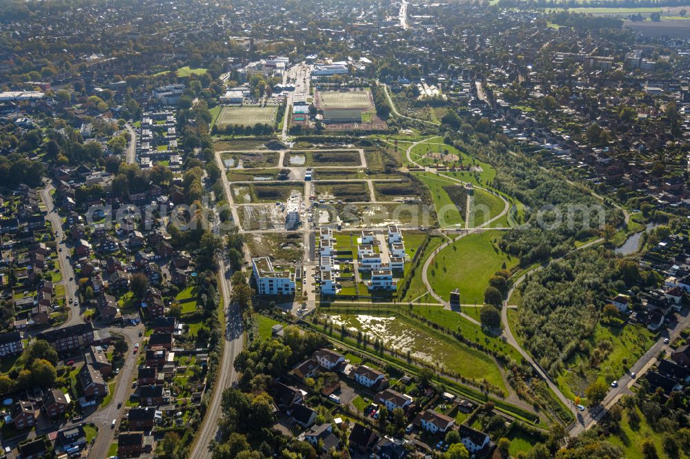 Selm from the bird's eye view: Construction sites for new construction residential area of detached housing estate on street Am Auenpark in Selm in the state North Rhine-Westphalia, Germany