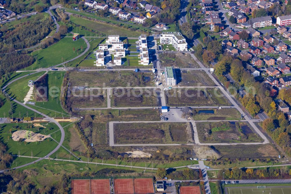 Selm from the bird's eye view: Construction sites for new construction residential area of detached housing estate on street Am Auenpark in Selm in the state North Rhine-Westphalia, Germany