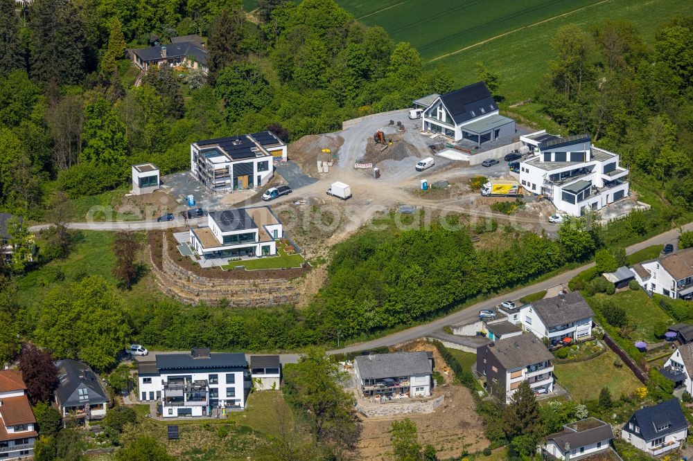 Aerial photograph Meschede - Construction sites for new construction residential area of detached housing estate Unterm Hasenfeld in Meschede in the state North Rhine-Westphalia, Germany