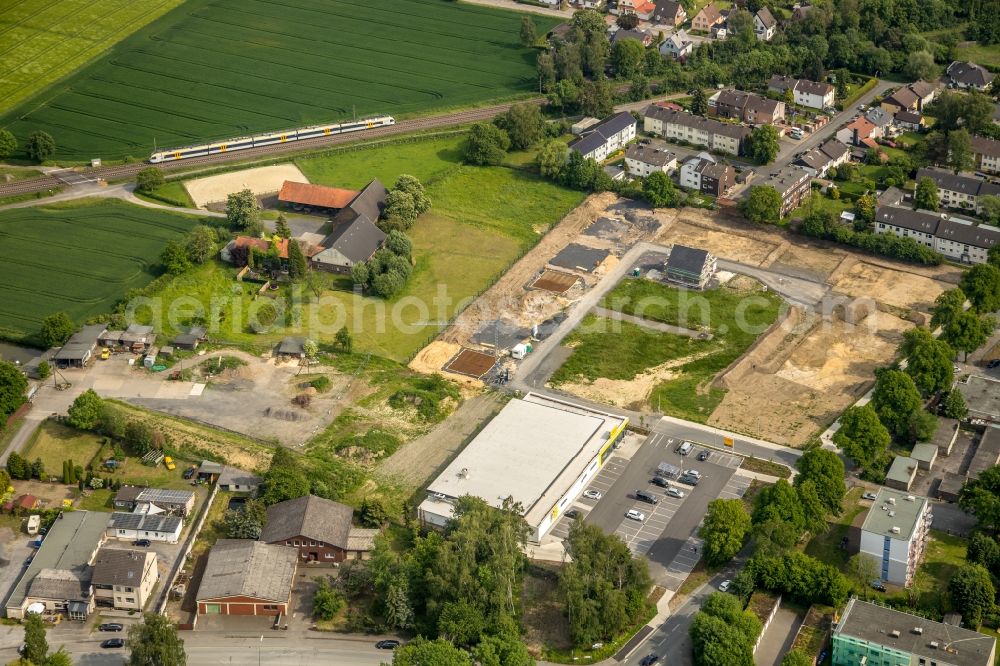 Aerial photograph Hamm - Construction sites for new construction residential area of detached housing estate on Weetfelder Strasse in Hamm in the state North Rhine-Westphalia, Germany