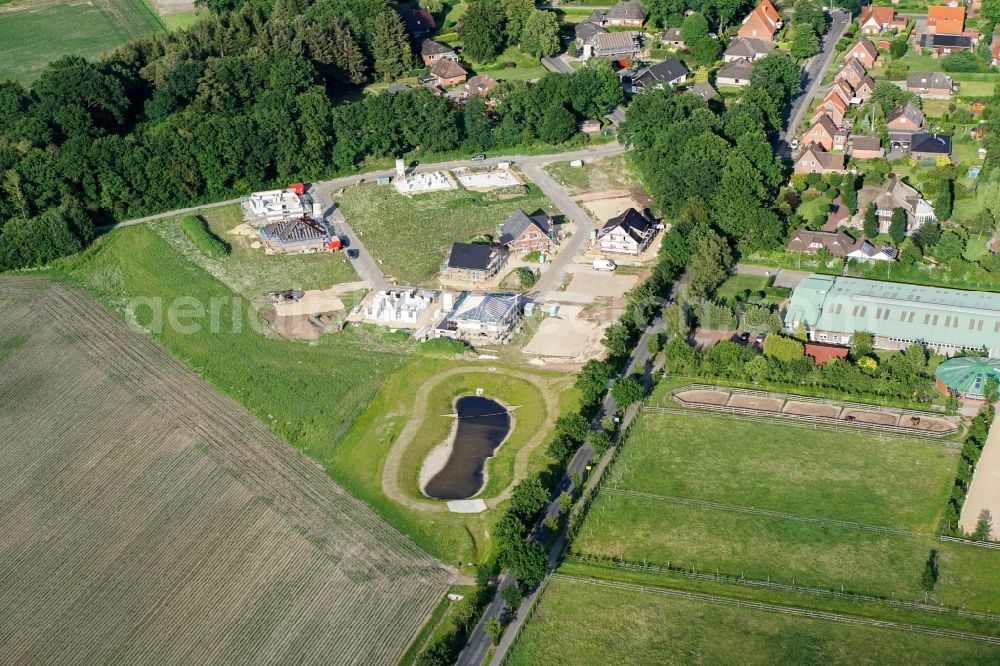 Stade from the bird's eye view: Construction sites for new construction residential area of detached housing estate Vor of Weide in Stade in the state Lower Saxony, Germany