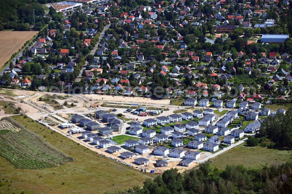 Schulzendorf from the bird's eye view: Construction sites for new construction residential area of detached housing estate Wohnen in Ritterschlag in Schulzendorf in the state Brandenburg, Germany