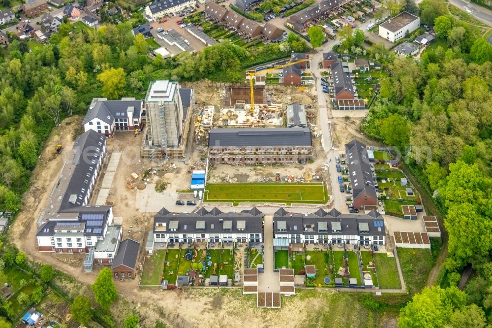 Oberhausen from the bird's eye view: Construction sites and development area for a new residential estate on site of the former mining pit and mine shaft IV of the Zeche Osterfeld in Oberhausen at Ruhrgebiet in the state of North Rhine-Westphalia