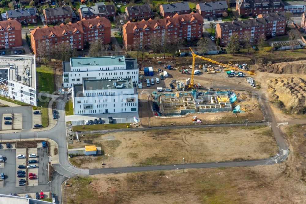 Hamm from the bird's eye view: Construction sites for the new residential area of a multi-family housing estate in Hamm in the state of North Rhine-Westphalia