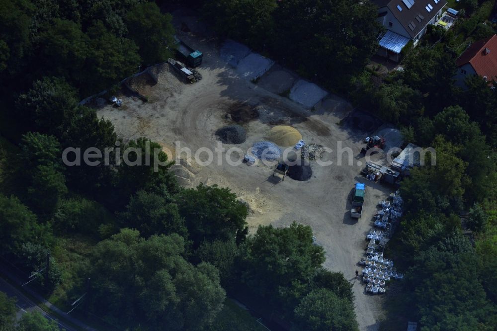 Aerial photograph Berlin OT Mahlsdorf - Construction material and gravel trading on Hultschiner Damm in Mahlsdorf district in Berlin