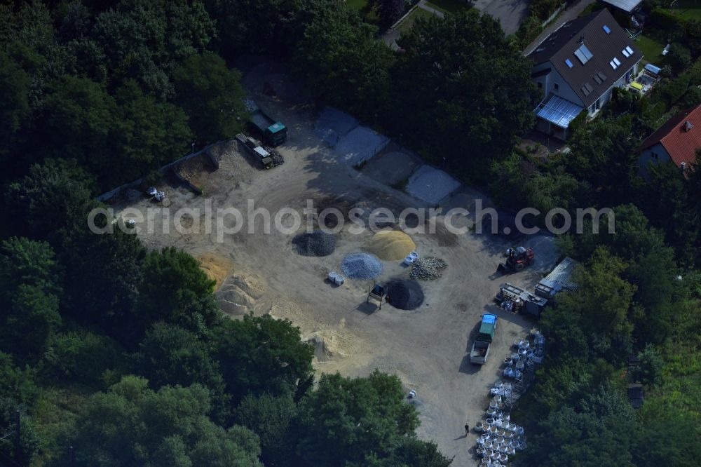 Berlin OT Mahlsdorf from the bird's eye view: Construction material and gravel trading on Hultschiner Damm in Mahlsdorf district in Berlin