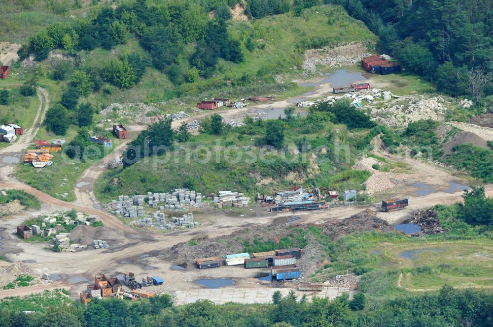 Bernau from the bird's eye view: Blick auf das Baustoff- und Recyclinggelände an der Schmetzdorfer Straße in Bernau - Ladeburg. Building materials and recycling center in Bernau - Ladeburg.