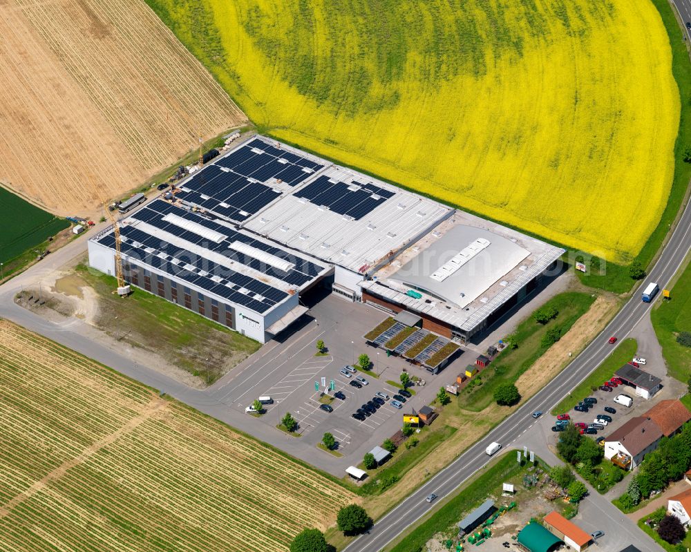 Aerial photograph Eberhardzell - Building Materials and logistics center of Firma MUeHLSCHLEGEL Holzhandelsgesellschaft mbH & Co. KG on street Sandelholzstrasse in Eberhardzell in the state Baden-Wuerttemberg, Germany