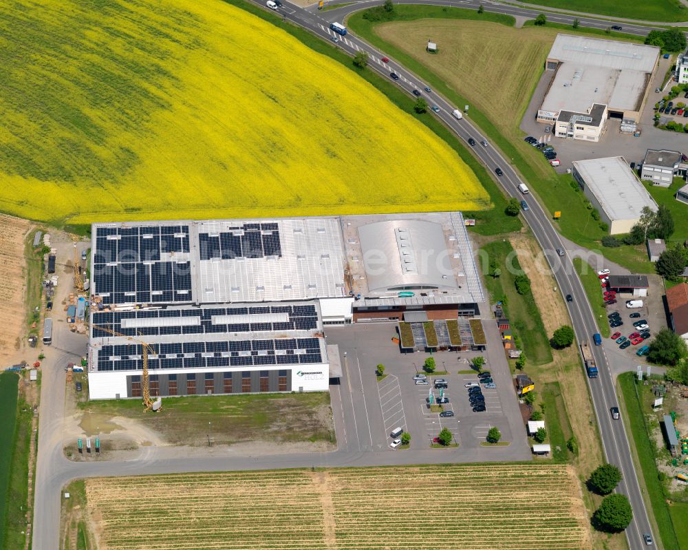 Eberhardzell from above - Building Materials and logistics center of Firma MUeHLSCHLEGEL Holzhandelsgesellschaft mbH & Co. KG on street Sandelholzstrasse in Eberhardzell in the state Baden-Wuerttemberg, Germany