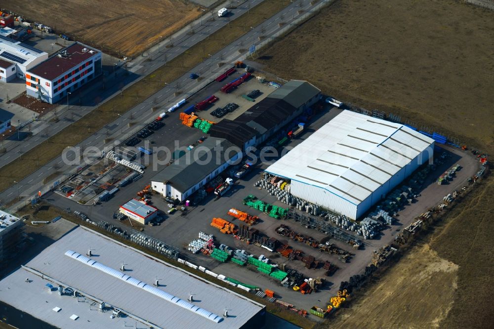 Berlin from above - Building Materials and logistics center of Muffenrohr Tiefbauhandel GmbH on Gross-Berliner Donm in the district Adlershof - Johannestal in Berlin, Germany