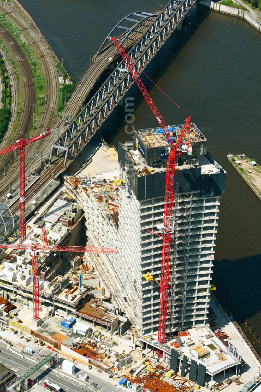 Aerial photograph Hamburg - Construction stop on the construction site for the new high-rise building complex Elbtower on Zweibrueckenstrasse between Oberhafenkanal and Norderelbe in the HafenCity district of Hamburg, Germany