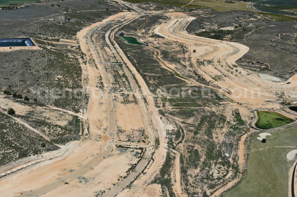 Casa Pelada from the bird's eye view: Freeze on developed land for holiday homes in Casa Pelada in the region of Murcia in Spain. The real estate and financial crisis has left their marks in the region