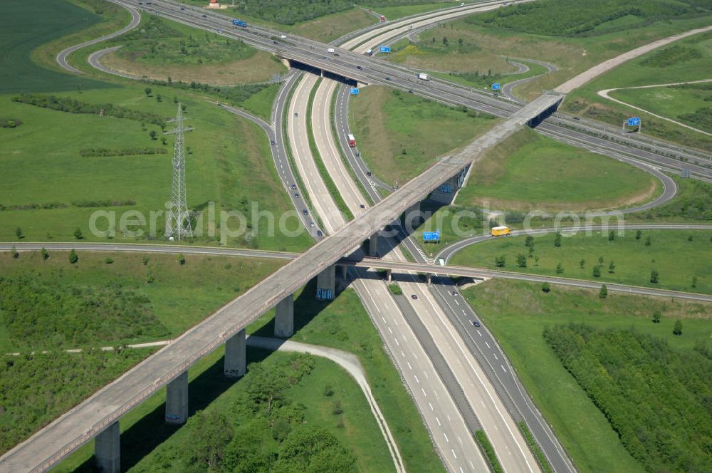 Ichtershausen from the bird's eye view: Blick auf die seit Jahren wegen Baustopp stillgelegten Viadukt der ICE-Trasse Erfurt-Nürnberg am Autobahnkreuz A4 / E40 - A71 bei Ichtershausen in Thüringen. Die bislang gleislose Eisenbahnstrecke NBS Ebensfeld–Erfurt ist Bestandteil des Verkehrsprojekt Deutsche Einheit Nummer 8.1 und ein Projekt der DB Verkehrswegebau und Hochtief. View of the building freeze occupied for years with viaducts of the ICE path Erfurt-Nürnberg at the intersection A4 / E40 - A71 near Ichtershausen in Thuringia.