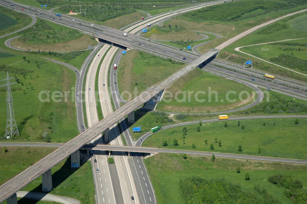 Aerial image Ichtershausen - Blick auf die seit Jahren wegen Baustopp stillgelegten Viadukt der ICE-Trasse Erfurt-Nürnberg am Autobahnkreuz A4 / E40 - A71 bei Ichtershausen in Thüringen. Die bislang gleislose Eisenbahnstrecke NBS Ebensfeld–Erfurt ist Bestandteil des Verkehrsprojekt Deutsche Einheit Nummer 8.1 und ein Projekt der DB Verkehrswegebau und Hochtief. View of the building freeze occupied for years with viaducts of the ICE path Erfurt-Nürnberg at the intersection A4 / E40 - A71 near Ichtershausen in Thuringia.