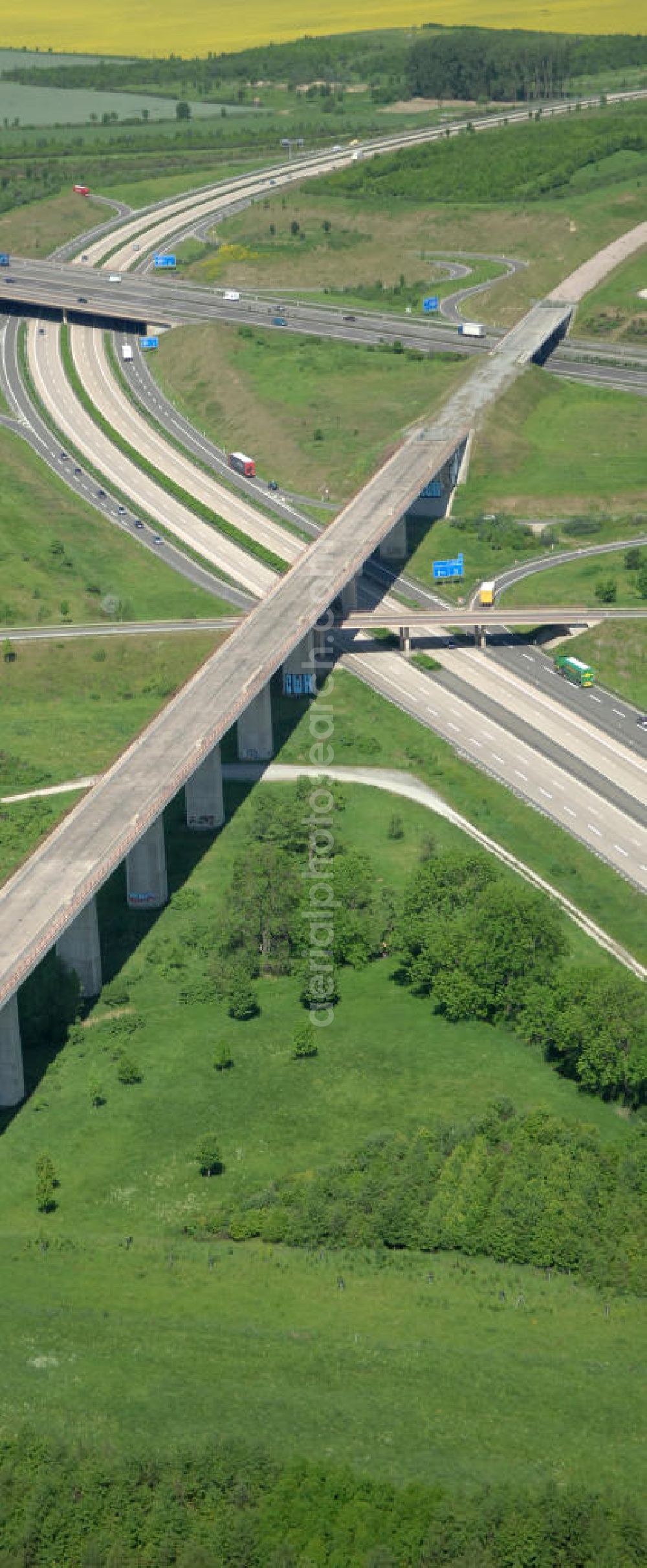 Ichtershausen from the bird's eye view: Blick auf die seit Jahren wegen Baustopp stillgelegten Viadukt der ICE-Trasse Erfurt-Nürnberg am Autobahnkreuz A4 / E40 - A71 bei Ichtershausen in Thüringen. Die bislang gleislose Eisenbahnstrecke NBS Ebensfeld–Erfurt ist Bestandteil des Verkehrsprojekt Deutsche Einheit Nummer 8.1 und ein Projekt der DB Verkehrswegebau und Hochtief. View of the building freeze occupied for years with viaducts of the ICE path Erfurt-Nürnberg at the intersection A4 / E40 - A71 near Ichtershausen in Thuringia.