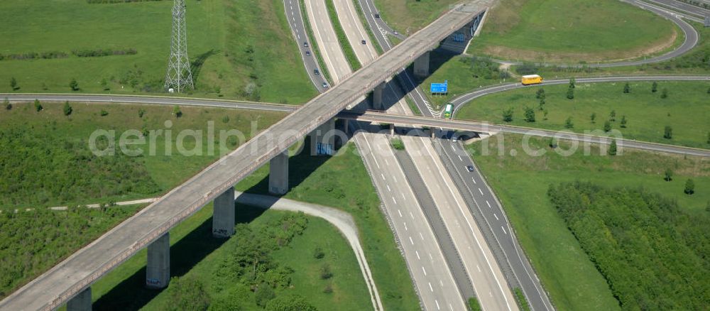 Aerial photograph Ichtershausen - Blick auf die seit Jahren wegen Baustopp stillgelegten Viadukt der ICE-Trasse Erfurt-Nürnberg am Autobahnkreuz A4 / E40 - A71 bei Ichtershausen in Thüringen. Die bislang gleislose Eisenbahnstrecke NBS Ebensfeld–Erfurt ist Bestandteil des Verkehrsprojekt Deutsche Einheit Nummer 8.1 und ein Projekt der DB Verkehrswegebau und Hochtief. View of the building freeze occupied for years with viaducts of the ICE path Erfurt-Nürnberg at the intersection A4 / E40 - A71 near Ichtershausen in Thuringia.