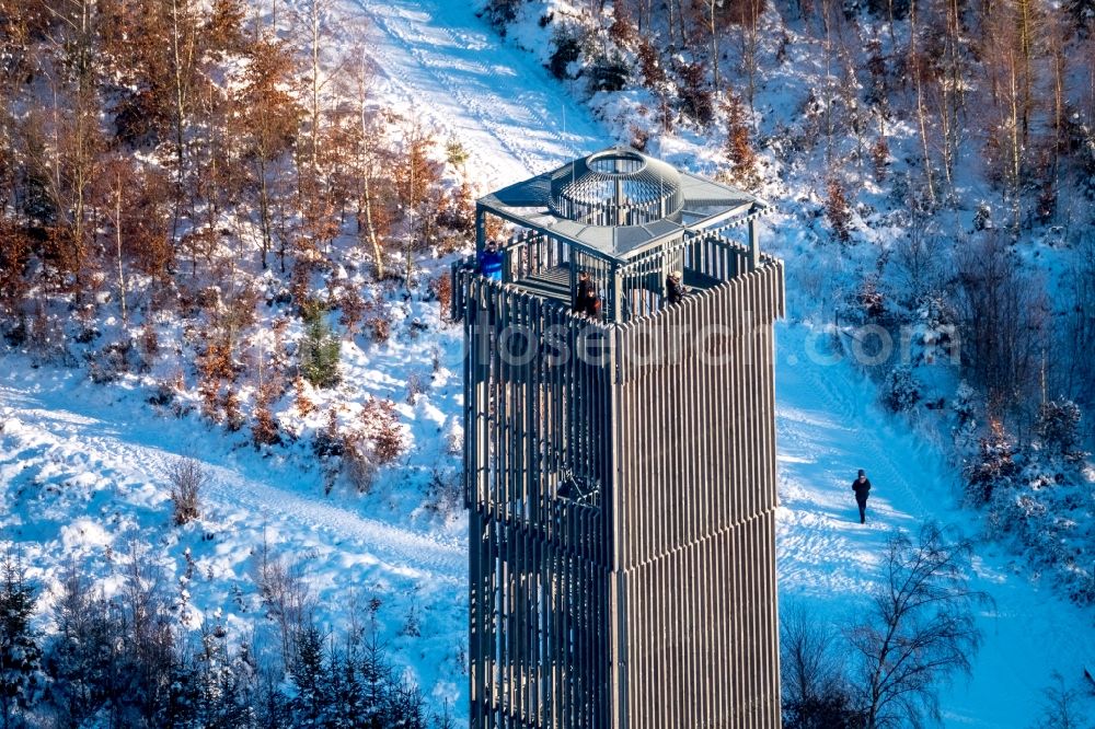 Möhnesee from above - Building of the observation tower Moehnesee tower in the wintry snow-covered Arnsberger wood in Moehnesee in the federal state North Rhine-Westphalia