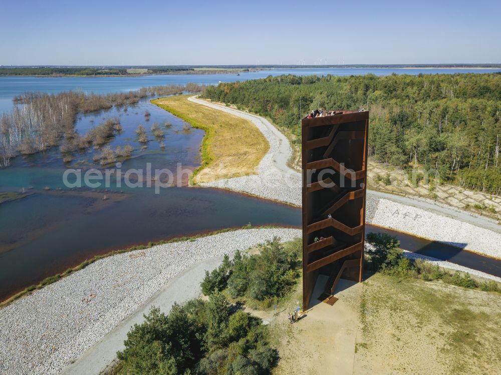 Großkoschen from above - Structure of the observation tower Rostiger Nagel on the banks of the Seedlitzer See and the Koschener See in Grosskoschen in the state Brandenburg, Germany