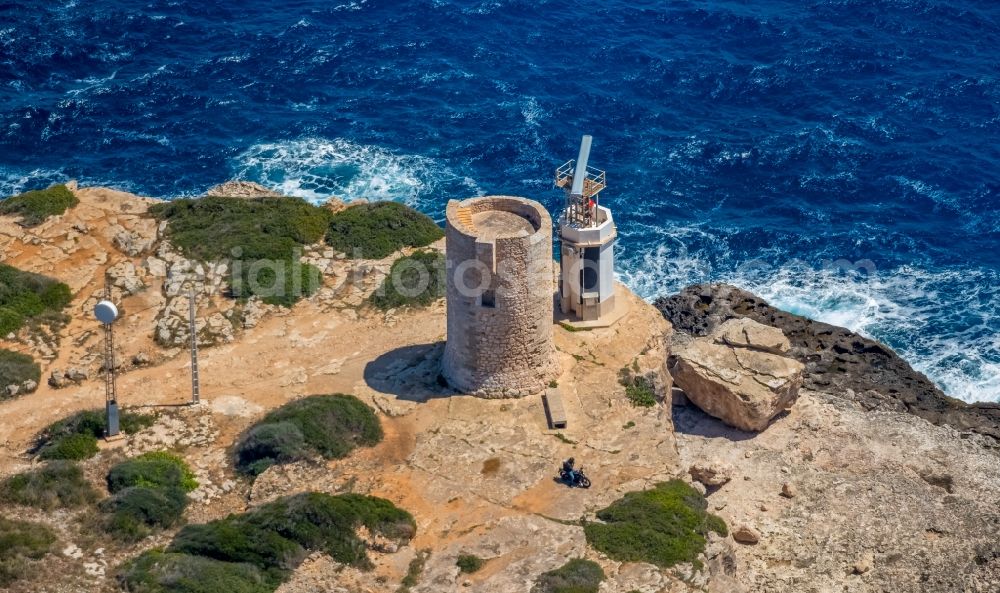 Aerial image Se Torre Nova - Structure of the observation tower of the defense tower Torre d'Ivan on the peninsula Roca Fesa in Se Torre Nova in Balearic island of Mallorca, Spain