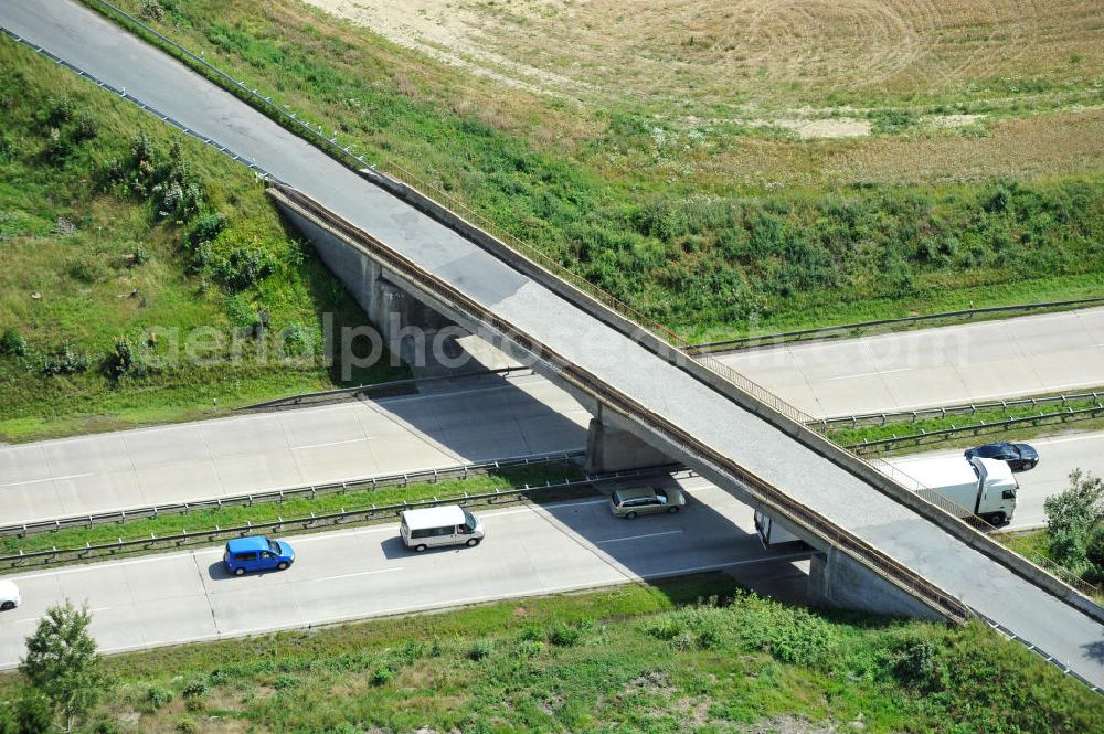 Dittersdorf from the bird's eye view: Bauwerke und Streckenführung der BAB Bundesautobahn A9 mit bisher vier Fahrstreifen. Derzeit laufen Vorbereitungsarbeiten für den sechsspurigen Ausbau der Autobahn 9 zwischen Triptis und Schleiz durch das deutsch-französisches Konsortium EUROVIA VINCI. Es ist das letzte Projekt im Rahmen des Verkehrsprojekt Deutsche Einheit Nummer zwölf der DEGES. Buildings and route of the motorway A9.