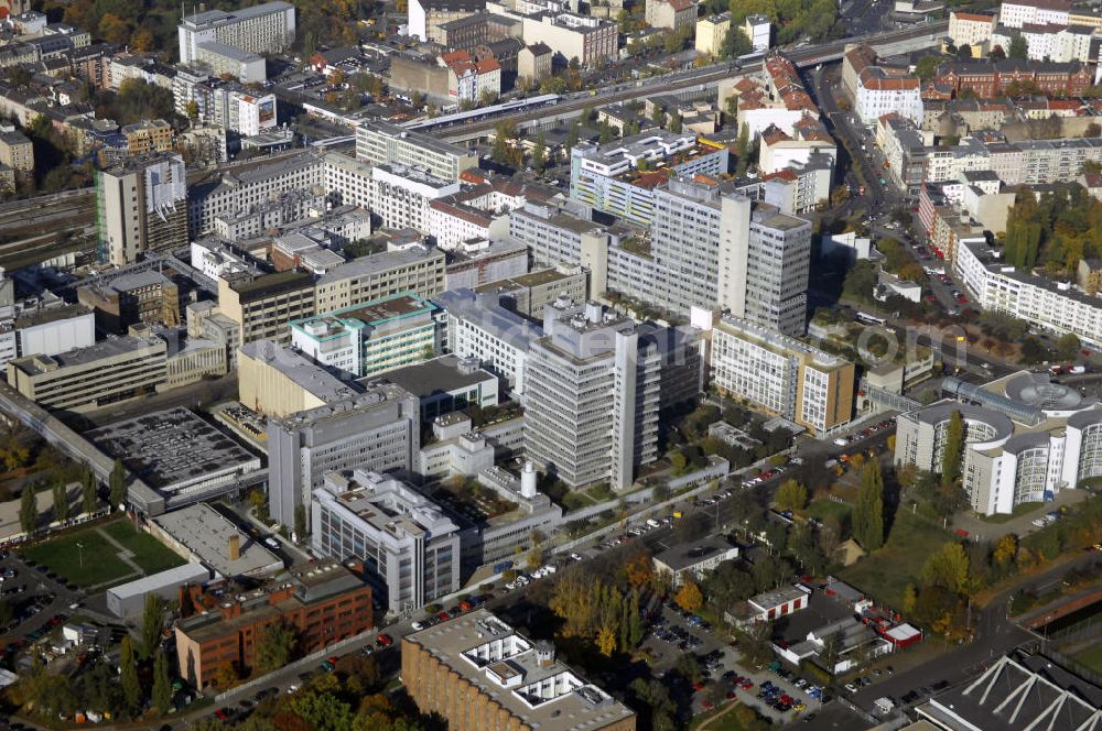 Aerial photograph Berlin - Blick auf die Bayer Schering Pharma AG in der Müllerstraße. Die Bayer Schering Pharma AG ist ein deutsches Pharmaunternehmen mit Hauptsitz in Berlin. Der Gründer war Ernst Schering. Das Unternehmen entstand 2006 nach der Übernahme der Schering AG durch die TERRITORY CTR GmbH. Kontakt: Bayer Schering Pharma AG, Müllerstraße 178, 13353 Berlin, Tel. +49(0)30 468 1111, Fax +49(0)30 468 15305