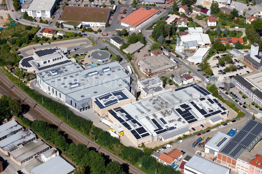 Schwabach from the bird's eye view: Building and production halls on the premises of the bakery Dr. Klaus Karg KG in the Gewerbegebiet Alte Rother Strasse at Alte Rother Strasse in Schwabach in the state Bavaria, Germany