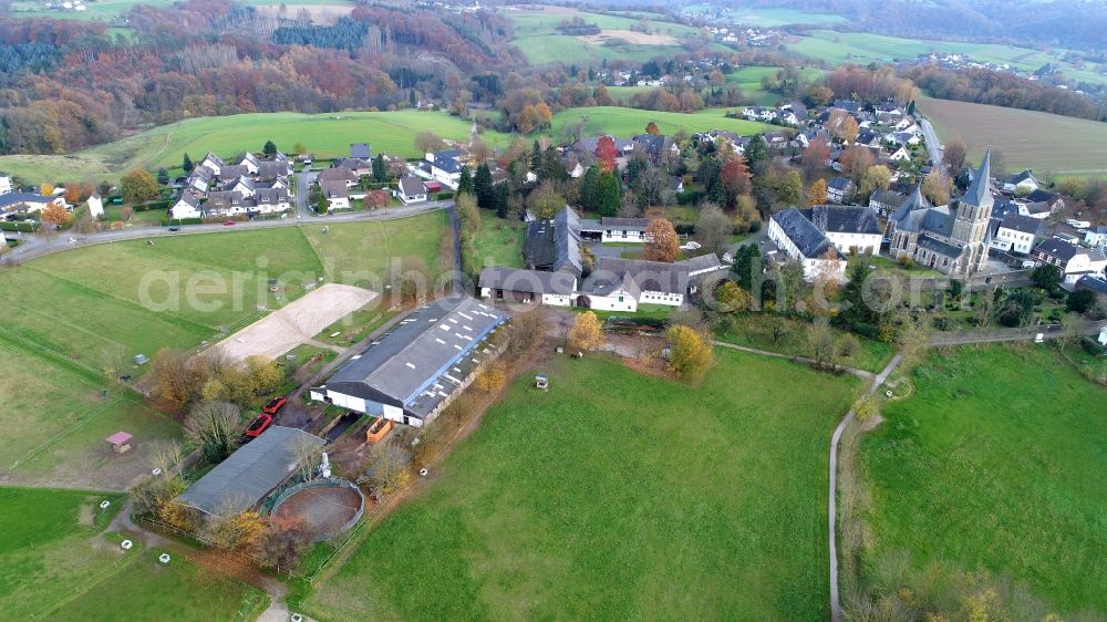 Hennef (Sieg) from the bird's eye view: The village of Boedingen with the pilgrimage church to the painful mother of God in the state North Rhine-Westphalia, Germany