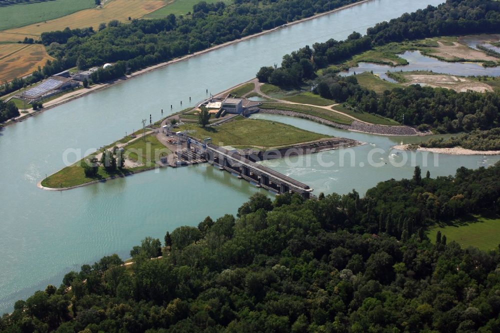 Village-Neuf from the bird's eye view: At Village-Neuf in France, the Grand Canal d'Alsace begins. The French company EdF operates a small hydro power plant and a fish ladder. Thus, the residual amount of water for the Old Rhine is utilized to produce electricity