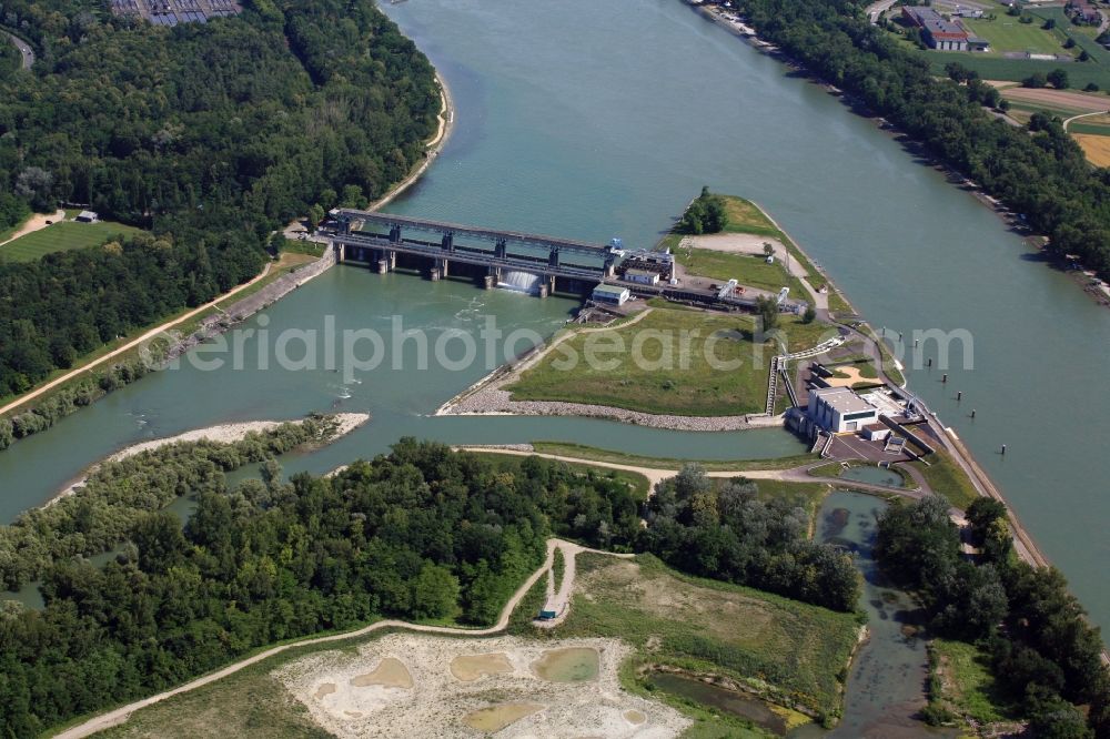 Village-Neuf from above - At Village-Neuf in France, the Grand Canal d'Alsace begins. The French company EdF operates a small hydro power plant and a fish ladder. Thus, the residual amount of water for the Old Rhine is utilized to produce electricity