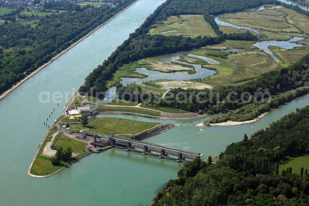 Weil am Rhein from above - At Village-Neuf in France, the Grand Canal d'Alsace begins. The French company EdF operates a small hydro power plant and a fish ladder. Thus, the residual amount of water for the Old Rhine is utilized to produce electricity