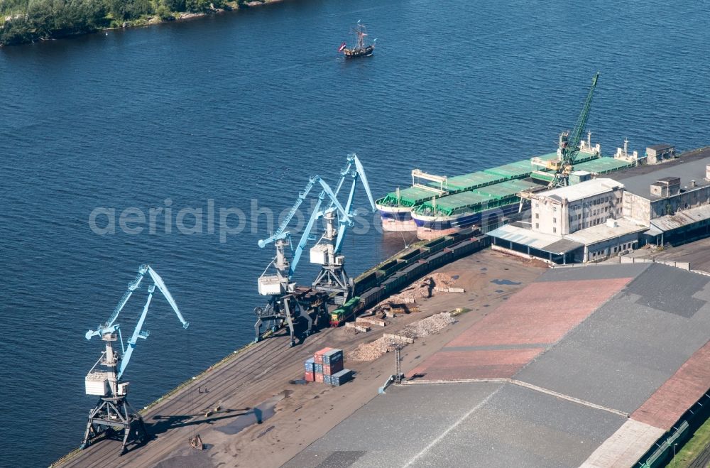 Aerial image Riga - Loading zone for coal and bulk material in the harbour in Riga in , Latvia