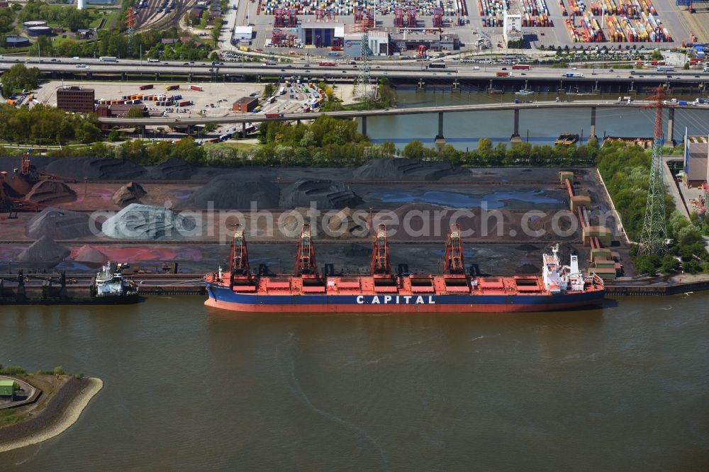 Hamburg from the bird's eye view: Loading zone for sand and bulk material in the harbour in Hamburg and refuse utilisation facility MVR Muellverwertung Rugenberger Damm GmbH & Co. KG