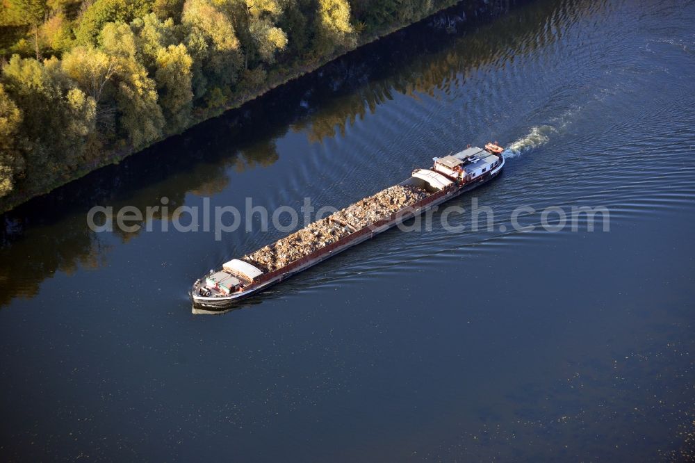 Groß Kreutz from above - View of a laden barge in Groß Kreutz in the state Brandenburg. The barge bears the name Paula, is laden with scrap and is travelling on the river Havel