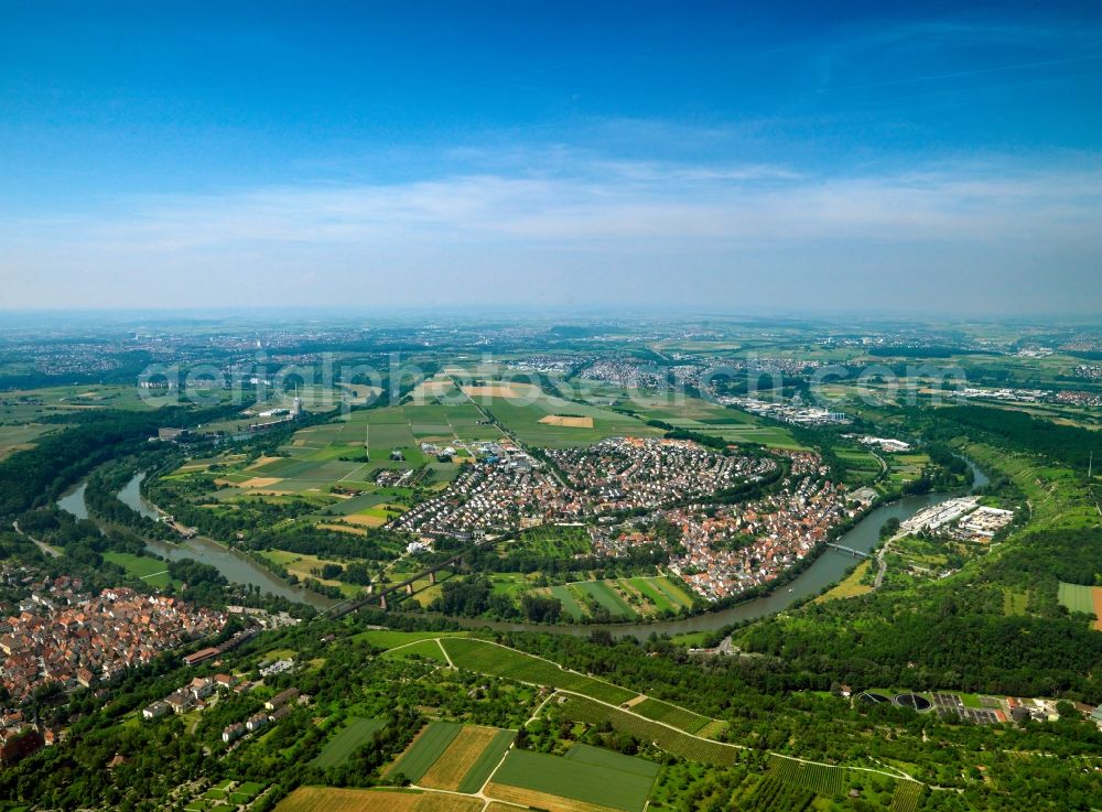 Benningen am Neckar from above - Benningen on the river Neckar in the county district of Ludwigsburg in the state of Baden-Württemberg. The borough is located in a horse shoe bend of the river. There is a very distinct railway bridge leading across the river