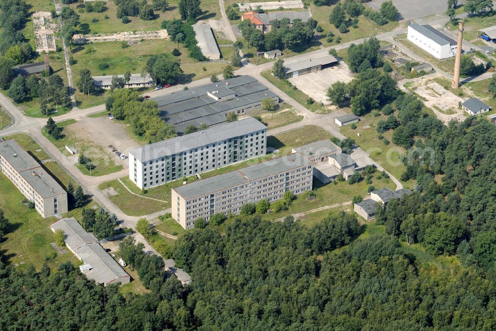 Aerial image BRANDENBURG BRIEST - Blick auf als Gewerbeflächen genutzte Bereiche des alten NVA / Bundeswehr - Flugplatz Briest. Die Grundstückseigentümerin Bundesanstalt für Immobilienaufgaben (Bima) will hier einen Solarenergie-Produzenten ansiedeln. View of commercial space used as parts of the old army / armed forces - the airport Briest.