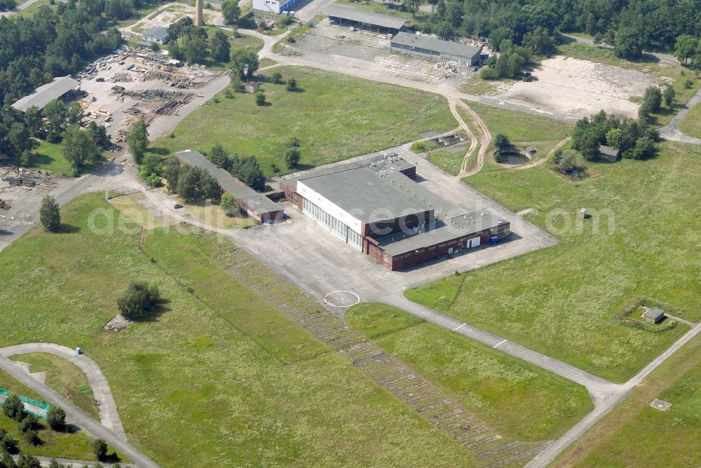 Aerial image BRANDENBURG BRIEST - Blick auf als Gewerbeflächen genutzte Bereiche des alten NVA / Bundeswehr - Flugplatz Briest. Die Grundstückseigentümerin Bundesanstalt für Immobilienaufgaben (Bima) will hier einen Solarenergie-Produzenten ansiedeln. View of commercial space used as parts of the old army / armed forces - the airport Briest.