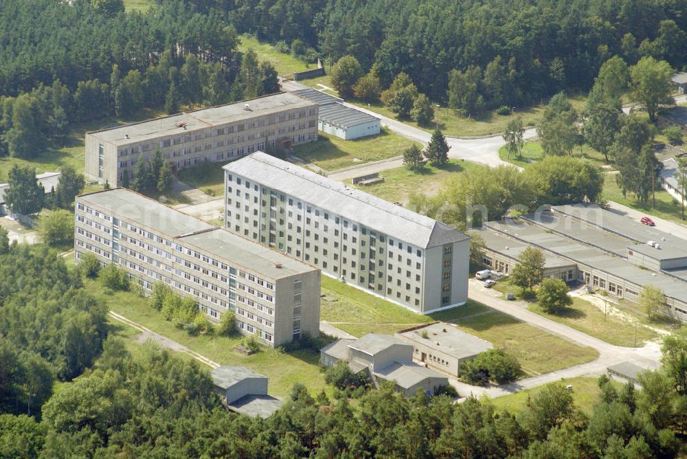 Aerial photograph BRANDENBURG BRIEST - Blick auf als Gewerbeflächen genutzte Bereiche des alten NVA / Bundeswehr - Flugplatz Briest. Die Grundstückseigentümerin Bundesanstalt für Immobilienaufgaben (Bima) will hier einen Solarenergie-Produzenten ansiedeln. View of commercial space used as parts of the old army / armed forces - the airport Briest.