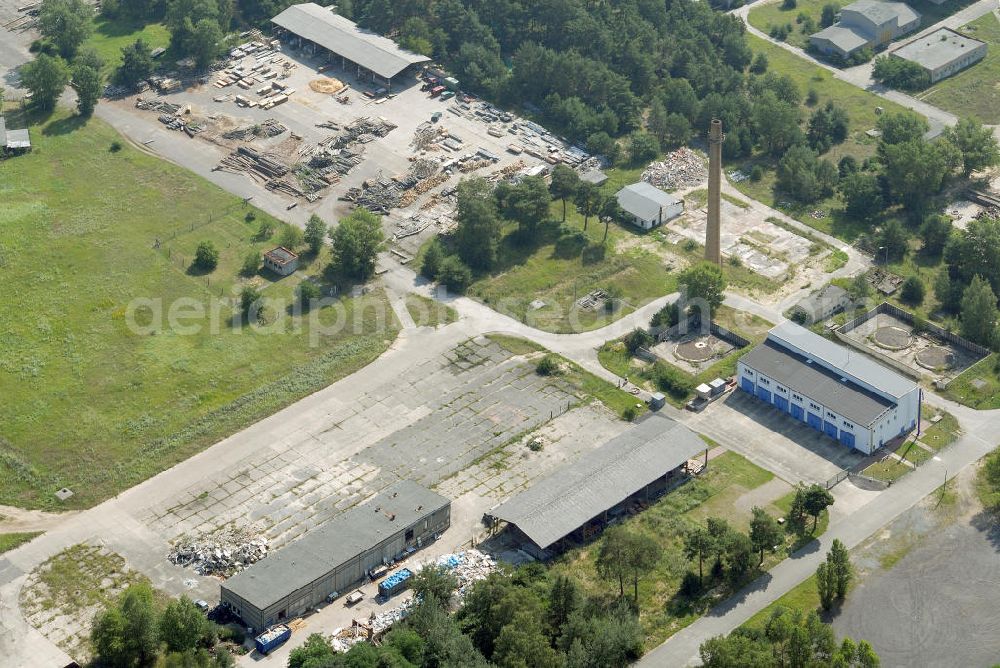 Aerial image BRANDENBURG BRIEST - Blick auf als Gewerbeflächen genutzte Bereiche des alten NVA / Bundeswehr - Flugplatz Briest. Die Grundstückseigentümerin Bundesanstalt für Immobilienaufgaben (Bima) will hier einen Solarenergie-Produzenten ansiedeln. View of commercial space used as parts of the old army / armed forces - the airport Briest.