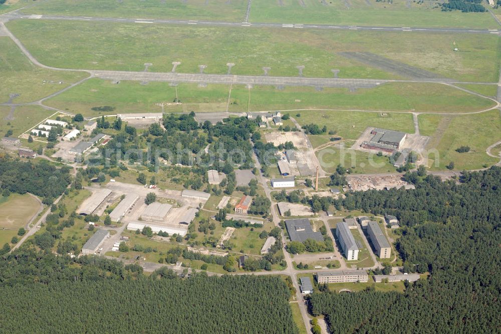 Aerial image BRANDENBURG BRIEST - Blick auf als Gewerbeflächen genutzte Bereiche des alten NVA / Bundeswehr - Flugplatz Briest. Die Grundstückseigentümerin Bundesanstalt für Immobilienaufgaben (Bima) will hier einen Solarenergie-Produzenten ansiedeln. View of commercial space used as parts of the old army / armed forces - the airport Briest.