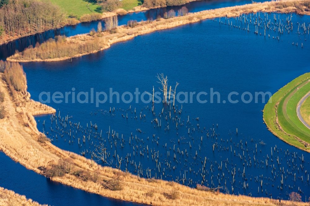 Estorf from above - Riparian areas and flooded flood meadows due to a river bed leading to flood levels of Naturschutzgebiet Osteschleifen in Estorf in the state Lower Saxony, Germany