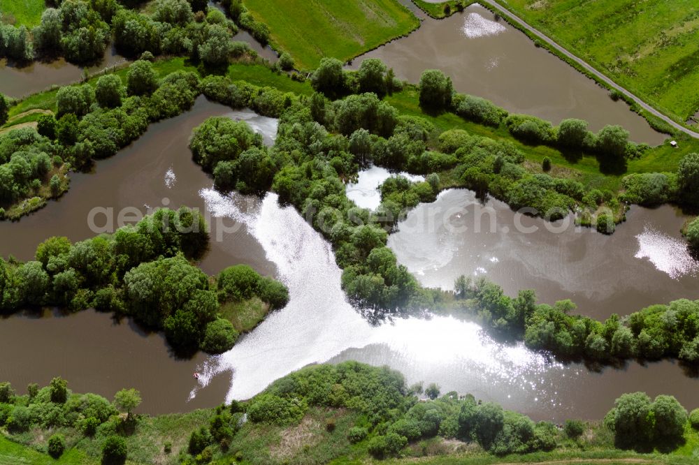 Bremen from above - Riparian areas and flooded flood meadows due to a river bed leading to flood levels Ochtum on street Hoveweg (Mittelshuchting) in the district Mittelshuchting in Bremen, Germany