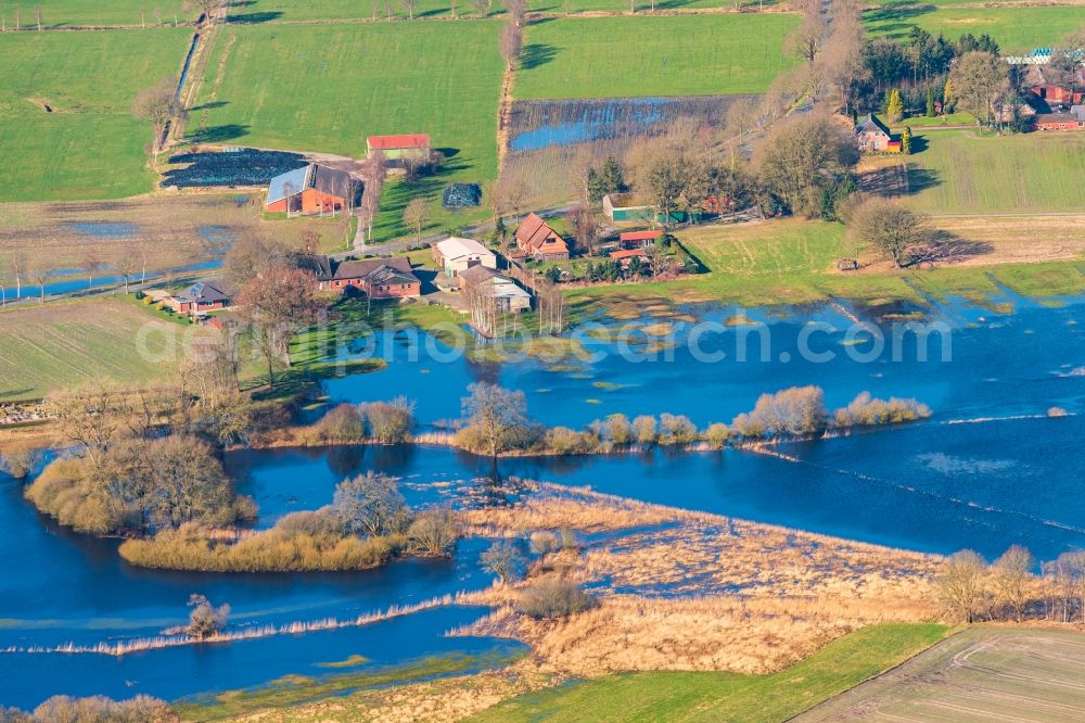 Bremervörde from the bird's eye view: Riparian areas and flooded flood meadows due to a river bed leading to flood levels of Oste in Bremervoerde in the state Lower Saxony, Germany