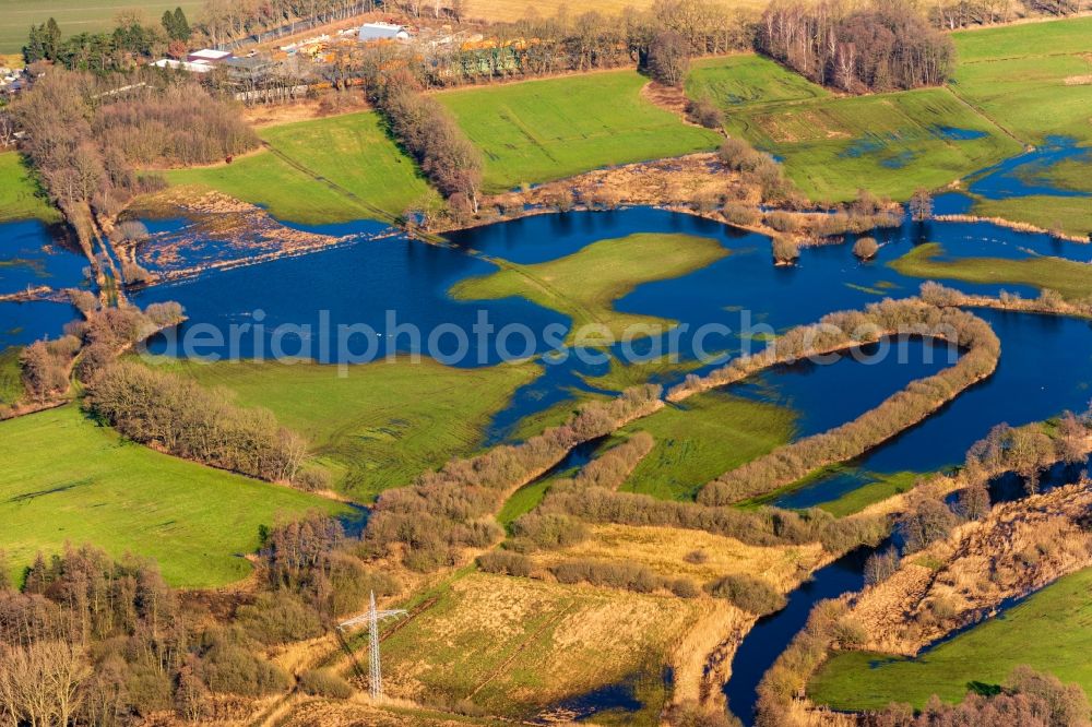 Bremervörde from the bird's eye view: Riparian areas and flooded flood meadows due to a river bed leading to flood levels of Oste in Bremervoerde in the state Lower Saxony, Germany